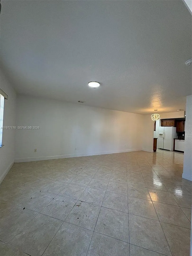 Building Photo - 7664 NW 182nd Ter #105