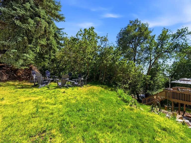 Large 0.26-acre lot featuring a spacious backyard and mature landscaping.