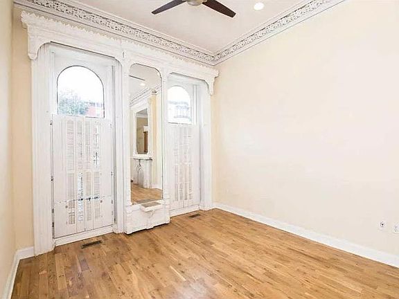 13-foot ceilings with original crown molding plus other architectural details from the original mansion.
