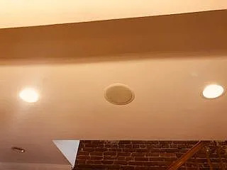 Recessed lighting and installed ceiling speaker on main level