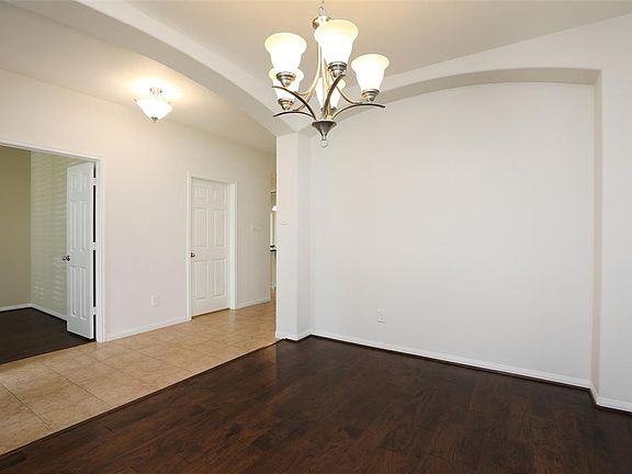 The formal dining has plenty of room for your large furniture and family and friends.