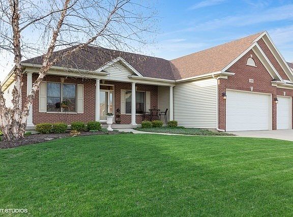 3-car garage and concrete driveway!
