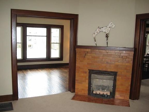The Warm Glow of the fireplace welcomes you to the Living Room 