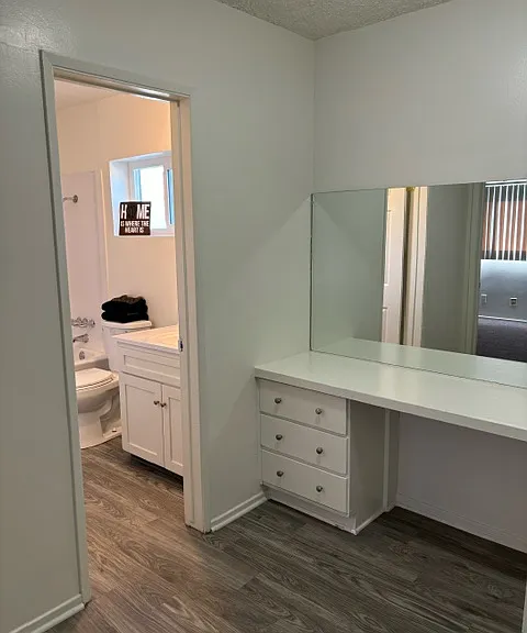 Hallway vanity cabinetry with lots of storage