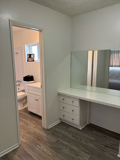 Hallway vanity cabinetry with lots of storage