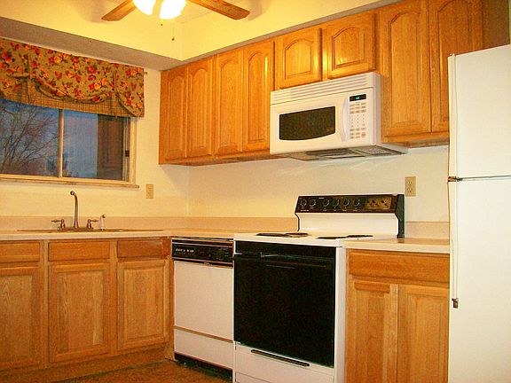 New,cabinets,floor,light fixtures,sink,faucet & microwave.