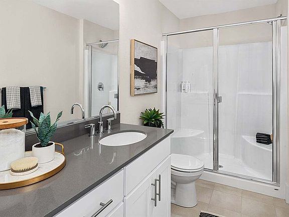 Light and Roomy Primary Bathroom at Provence, Townes at Vineyard