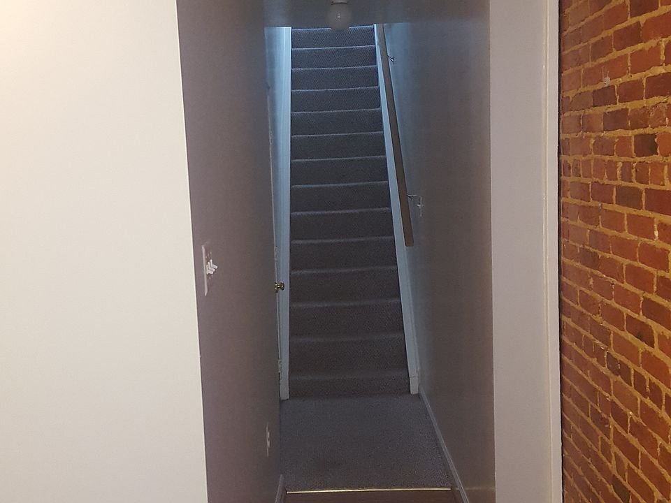 Stairs up to second floor bedroom / Hallway entrance to deck