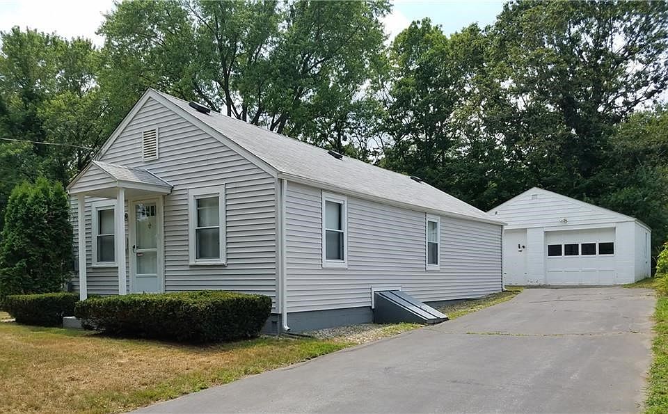 Front Exterior, Roomy Drive Way and Extra Large Garage and Electric Door Opener.