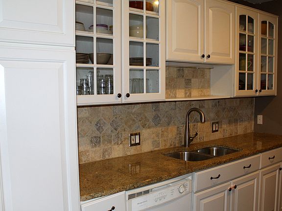 Newer cabinets and granite countertops in the Kitchen