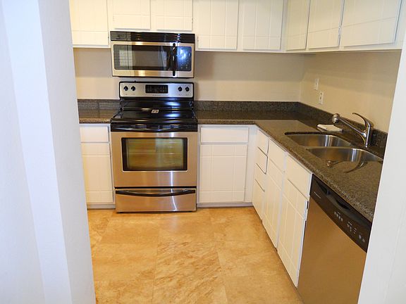 Kitchen with Travertine flooring
