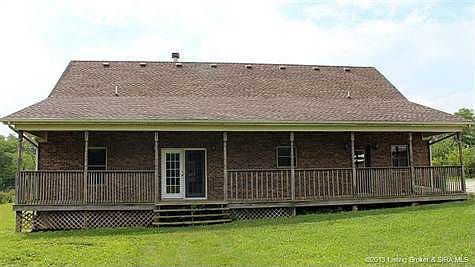 Rear view of home with an 8x52 covered back porch.