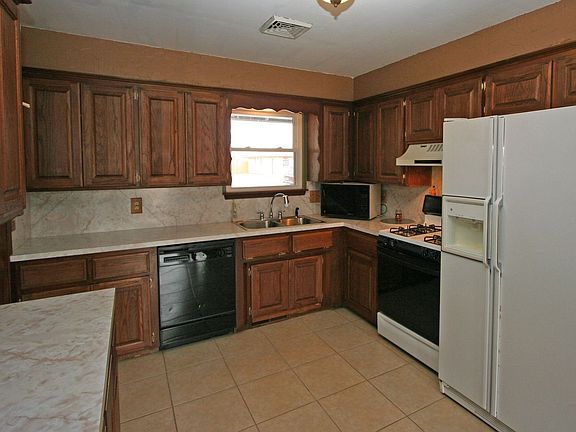 New paint, cabinet fronts and gas range