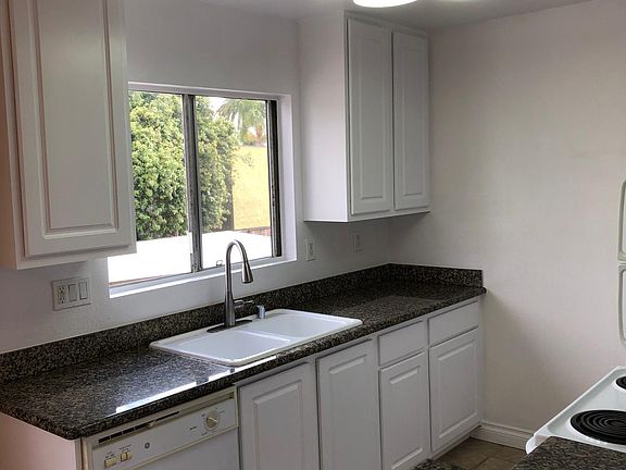 Refinished Cabinets with new LED light fixture