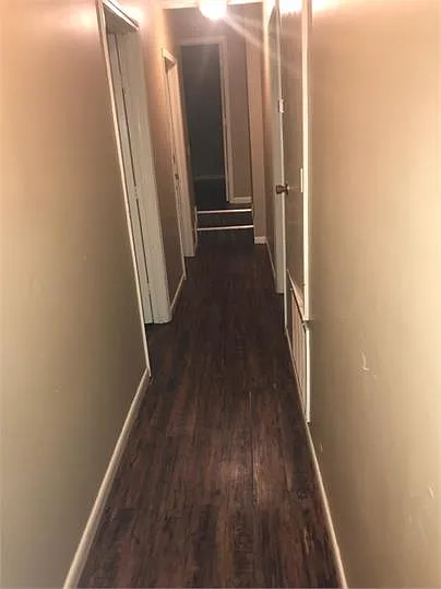 Hallway to bedrooms & bathroom - Located to the right of kitchen