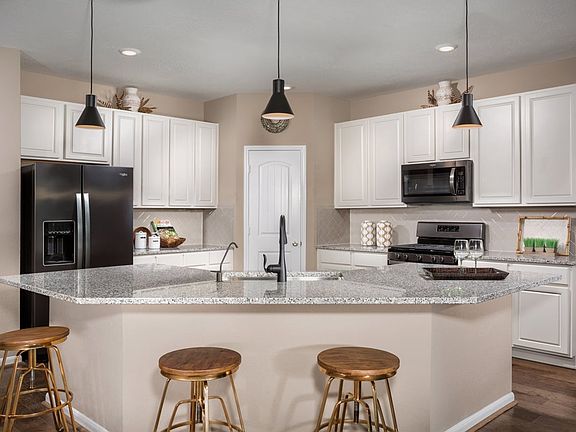 Plan 2130 Kitchen as modeled at Bryan Crossing