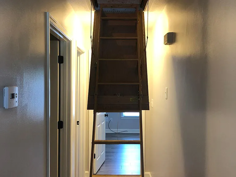 Pull down for extra storage in attic