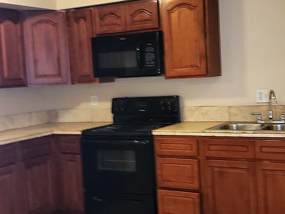 5th image of 4402 E Saint Anne Ave