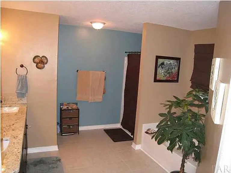 7570 Woodmont St — Photo 12