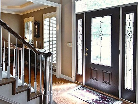 As you enter the gracious two story foyer, you will immediately feel at home