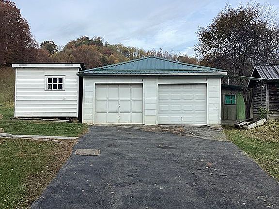 Garage & wood shop in rear