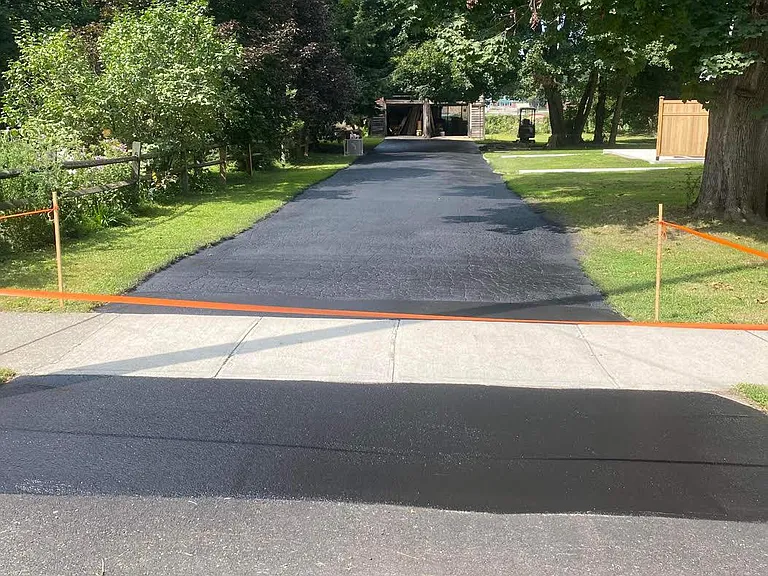 Newly sealed, long, double width driveway for abundant off-street parking.
