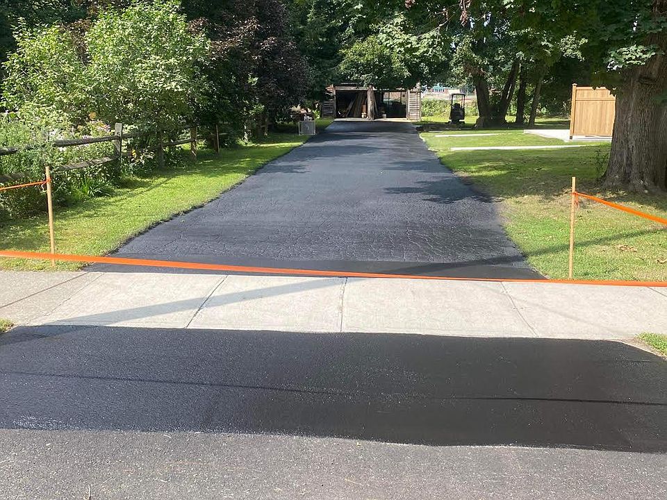 Long, double wide driveway for abundant off-street parking.