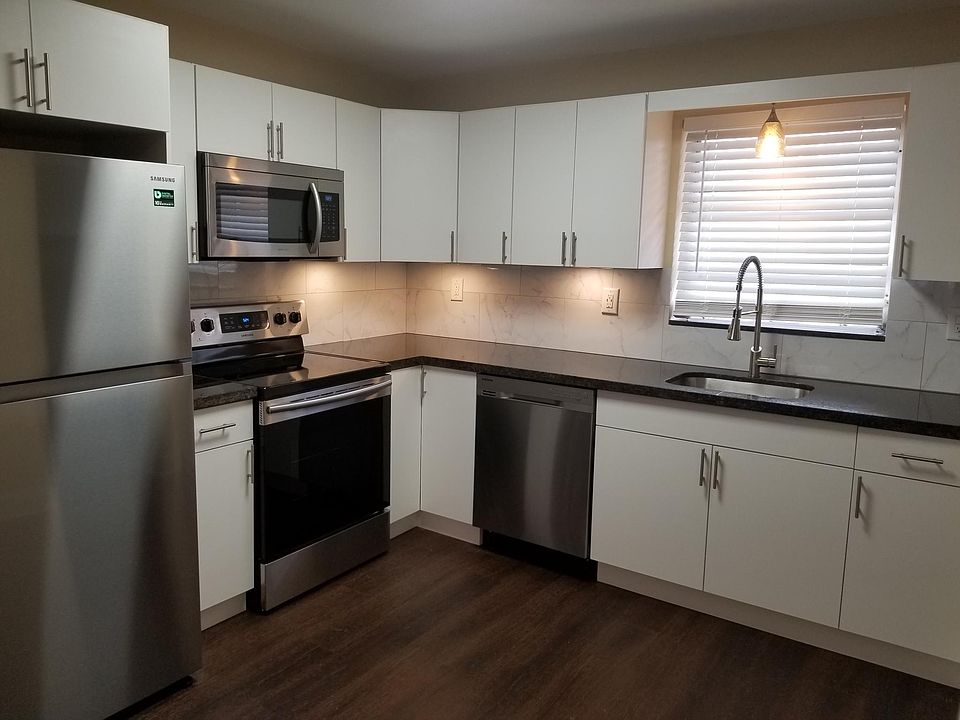 Kitchen with granite countertops and stainless steel appliances