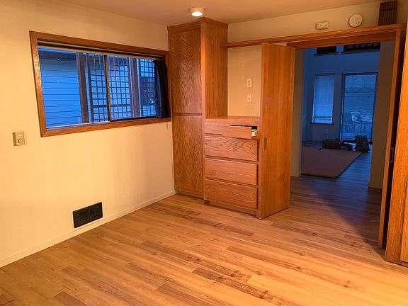 Master bedroom with french doors that open to the main living area.