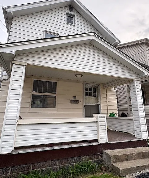 Front of home with covered front porch