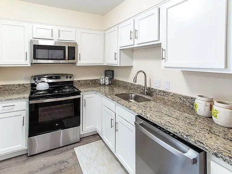 KITCHEN IN MODEL APARTMENT - COOLIDGE FLOORPLAN
