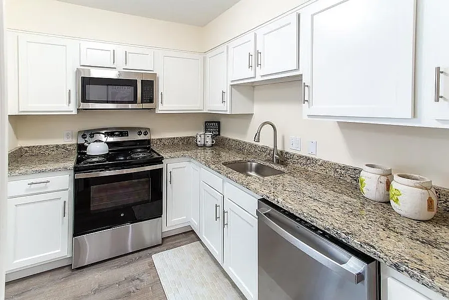 KITCHEN IN MODEL APARTMENT - COOLIDGE FLOORPLAN