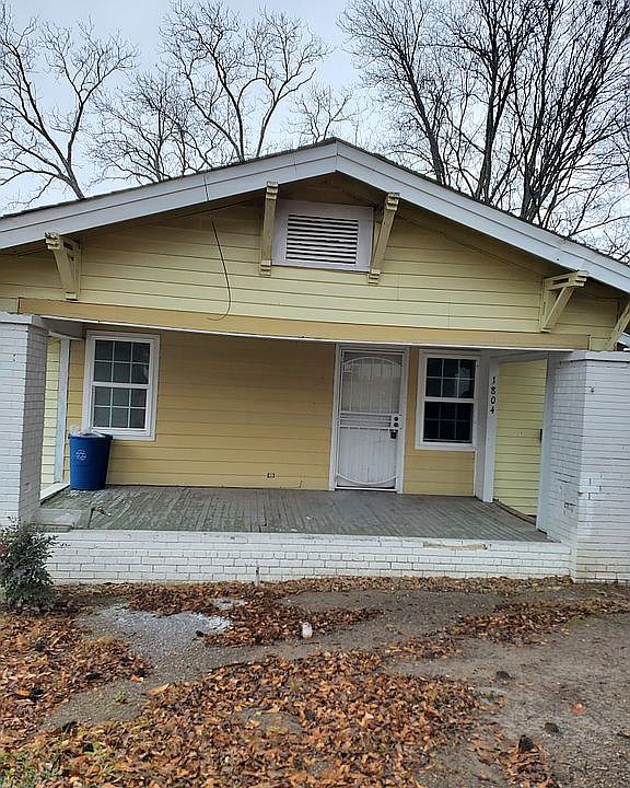 Front of House with large porch