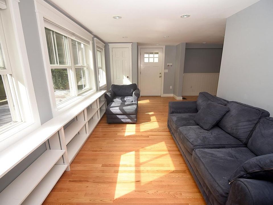 Living room area with a lot of windows for natural light
