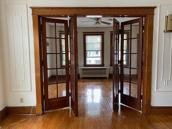 Dinning room with original French doors leading to Living room.