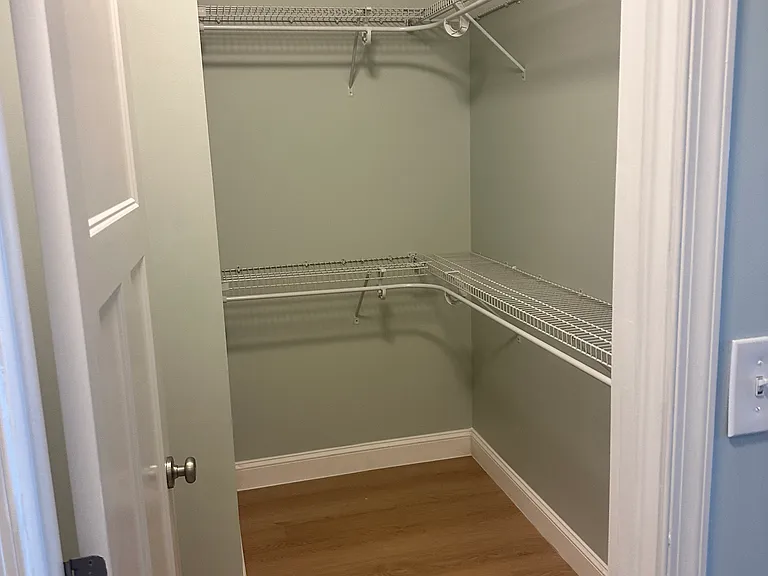 Walk in closet of second bedroom