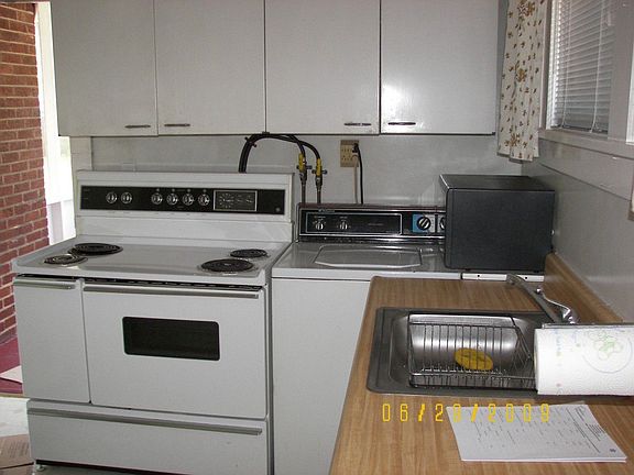 Kitchen with Stove and Refrigerator