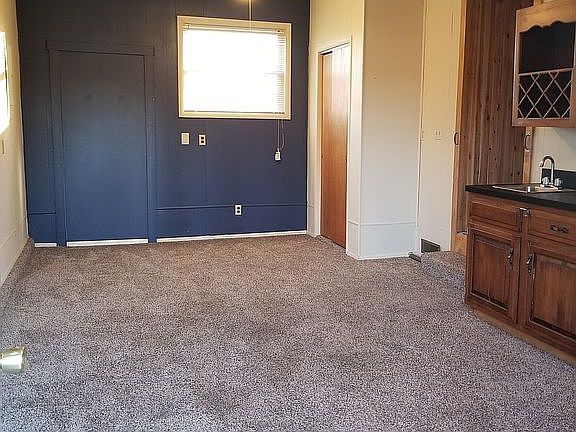 Den leading to back door