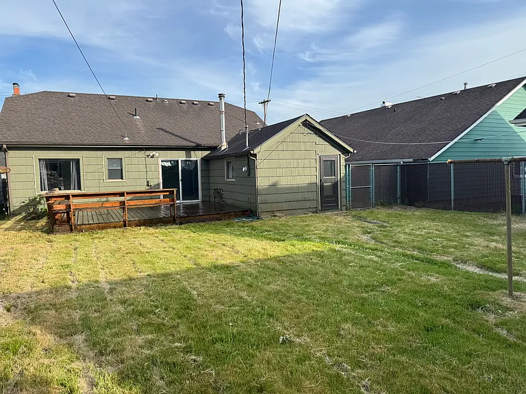 The backyard is large and has a fence, garage and lots of space!