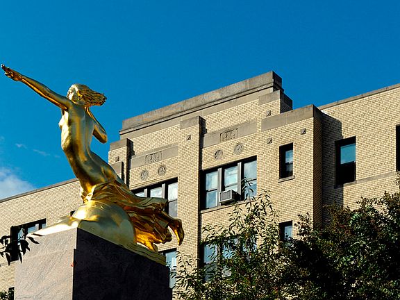 View from the street of Park Marconi's garden statue