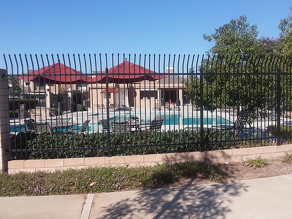 Pool area next to townhouse