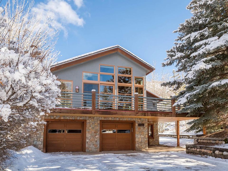 Heated 2-car garage and large driveway