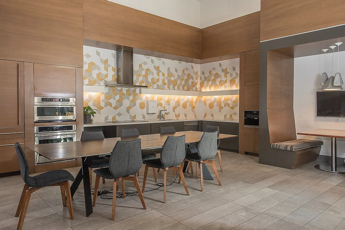 Co-working and conference lounge designed for productivity and convenience at Aster Apartments near BART. - Aster