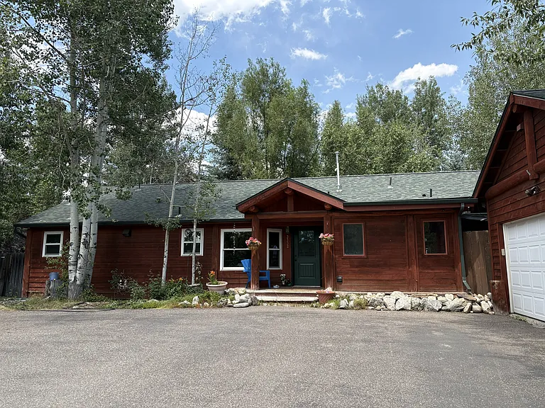 Large driveway and heated garage