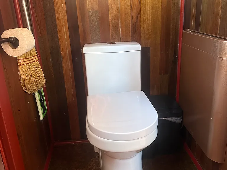 The dual flush toilet and wall mounted silent convection heater are two of the many water and energy saving features of The Lucky Penny.