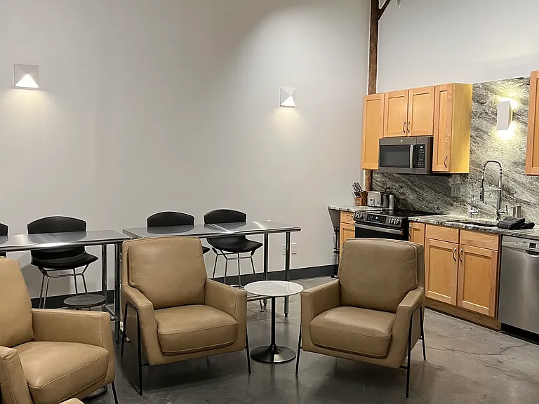 Another view of the living room and kitchen