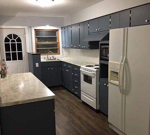 Kitchen with all appliances included - dishwasher, microwave