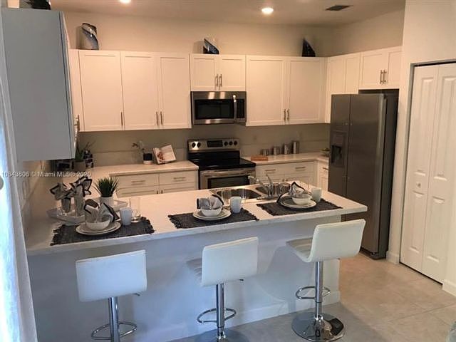 1st image of 582 NE 207th St #0