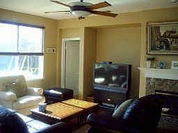 Granite fireplace in a welcoming family room setting!