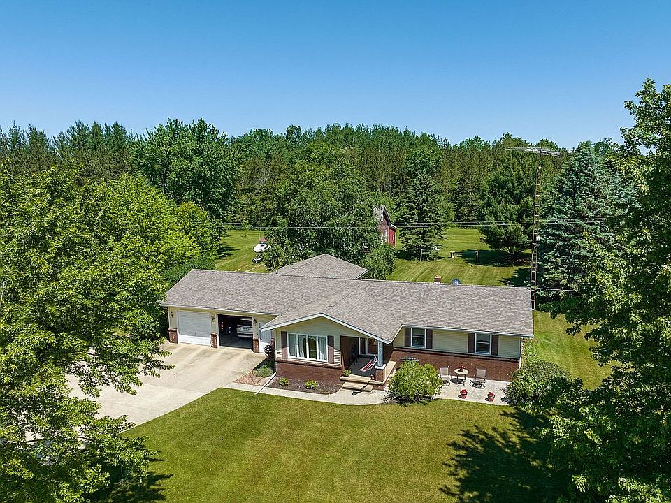 Acreage red building in back